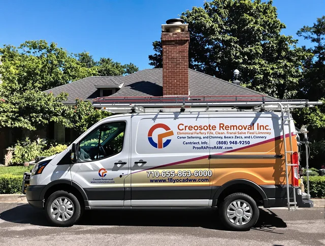 Scituate Chimney Sweep technician removing creosote safely in Scituate, MA